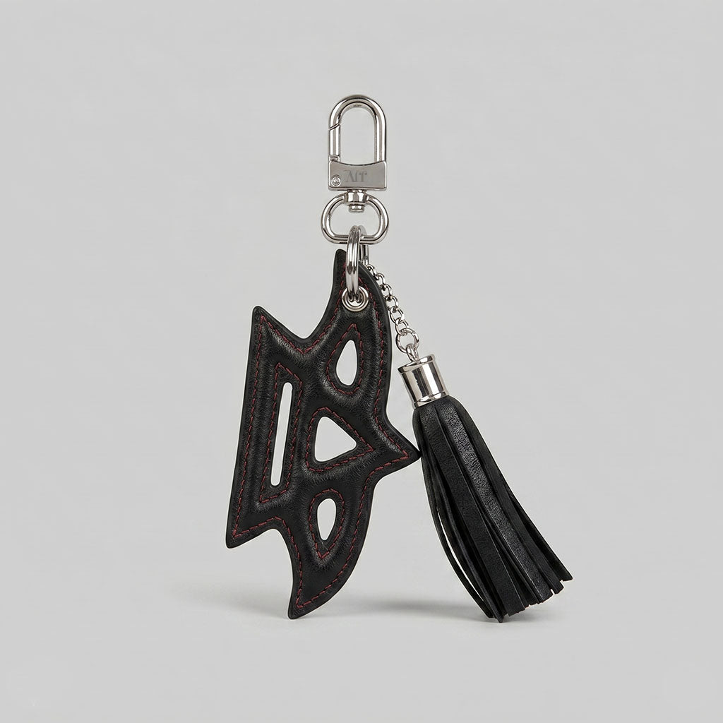 Noir Phoenix Tassel Charm
