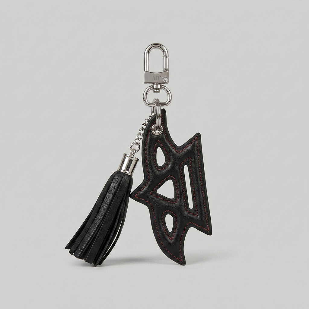 Noir Phoenix Tassel Charm