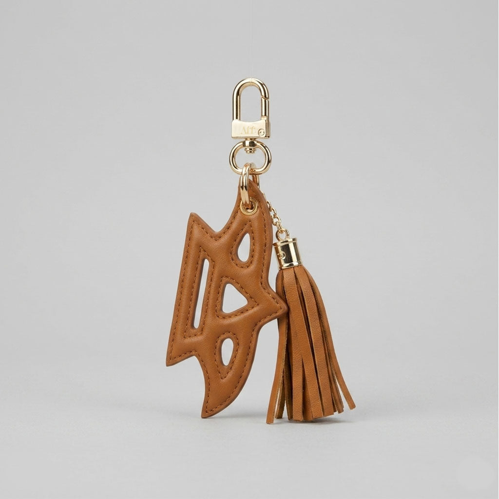 Tan Phoenix Tassel Charm